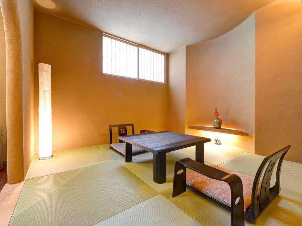 Отель Yunokawa Onsen Shouen Sinzi Экстерьер фото